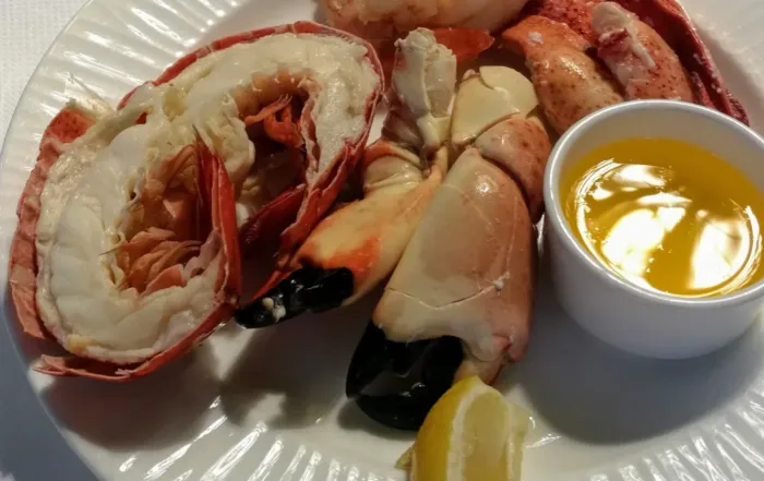 A plate of stone crab claws and half lobster tails