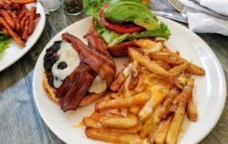A Bacon Cheese Burger and Fries