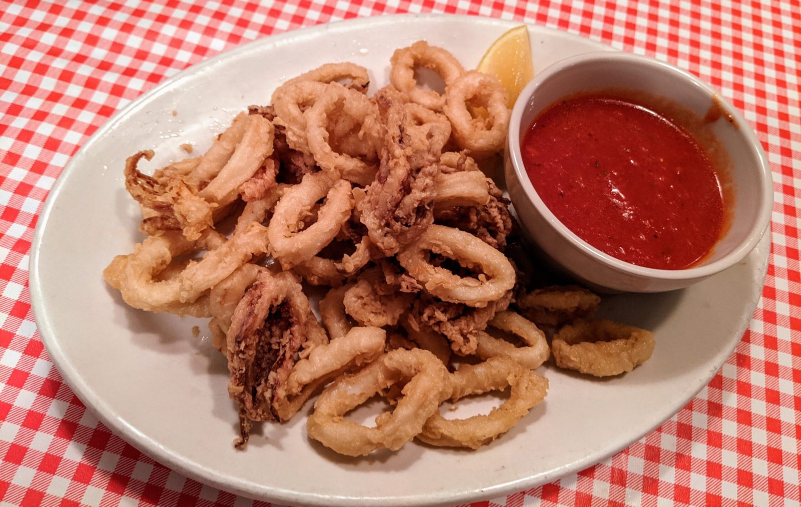 Fried Calamari with a cup of marinara sauce