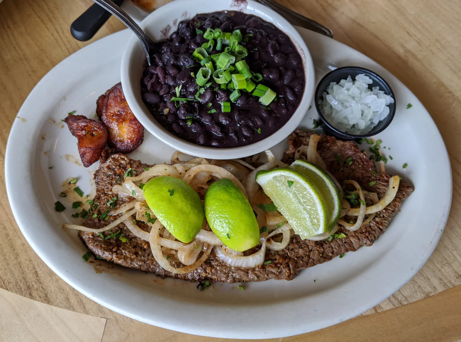 Grilled Steak with a cup of Black Beans