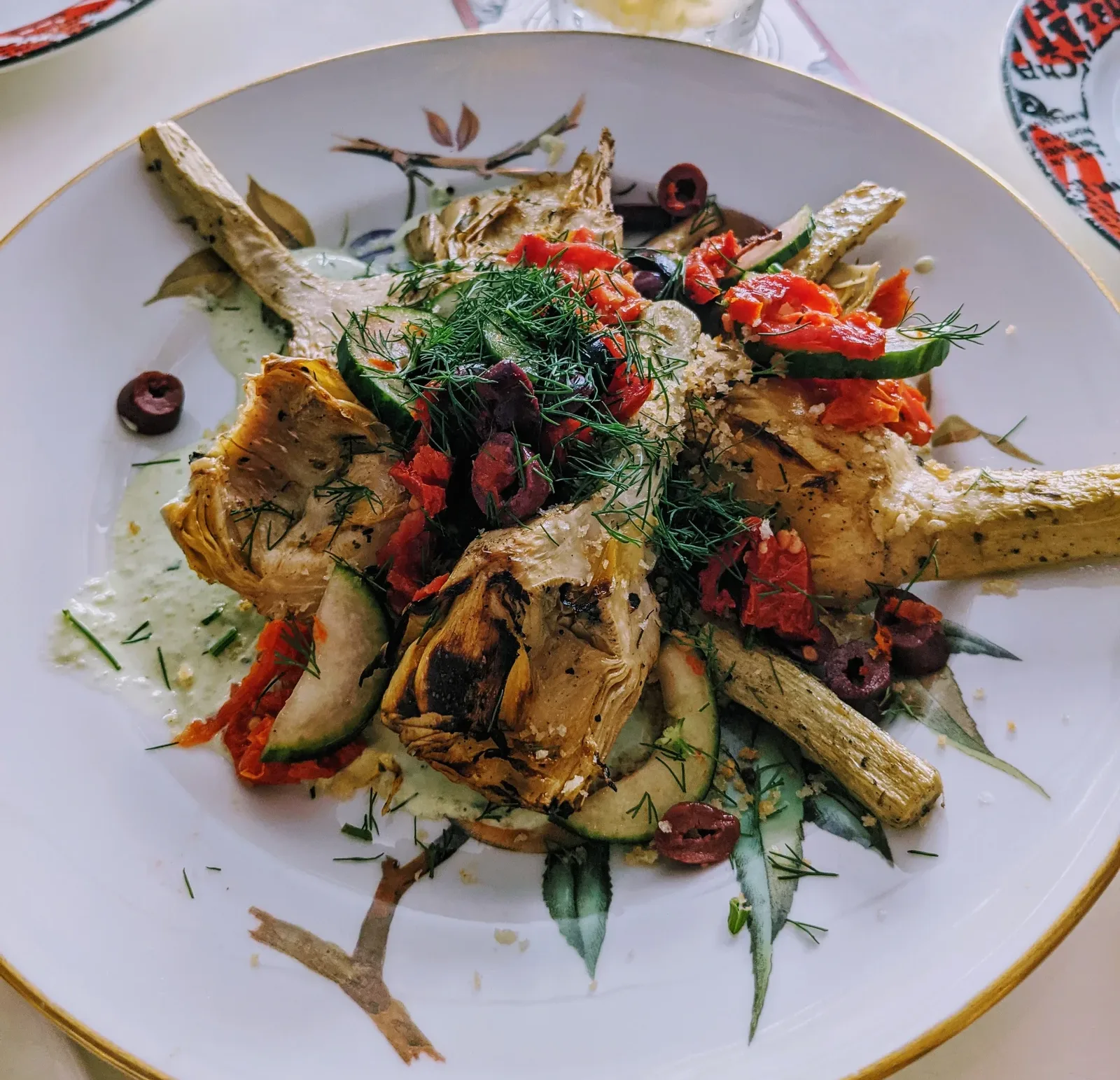 Artichoke Salad topped with a sprig of dill