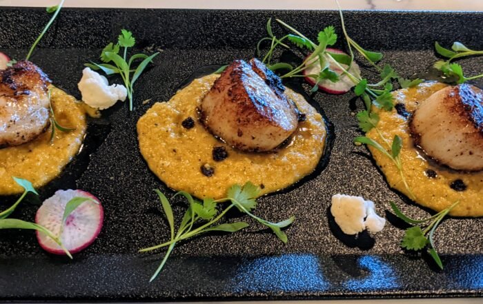 3 pan seard scallops set on puree potato