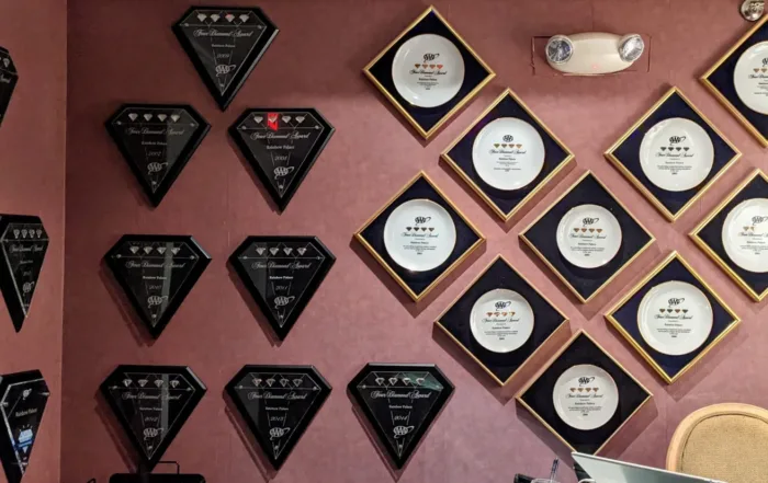 Dining awards on wall behind front desk