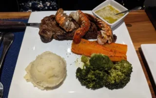 NY strip steak and 3 half lobster tails