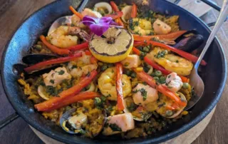 Paella in a blacl paella pan