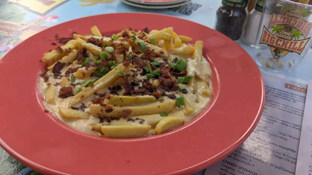 Fries in a shrimp Bisque topped with Bacon