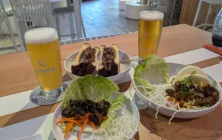 2 beers a wagu smash burger, lettuce wrap and a mushroom lettuce taco