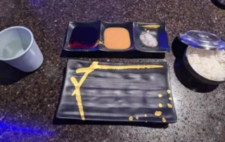 Proper Korean BBQ Setup - water Sauces, Salt and Pepper and an empty plate