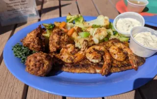 Blackened grouper, Shrimp and Conck fritters
