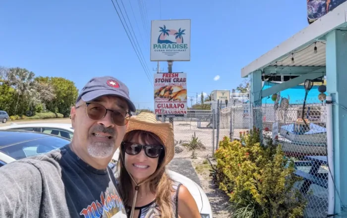 Dan and Doris in front of Paradise sign