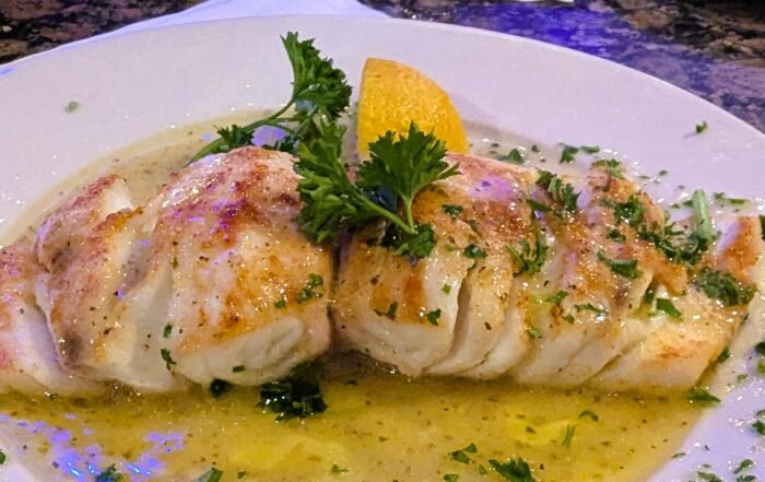 FRESH FILET OF GROUPER LADOREGAN with alemon on top
