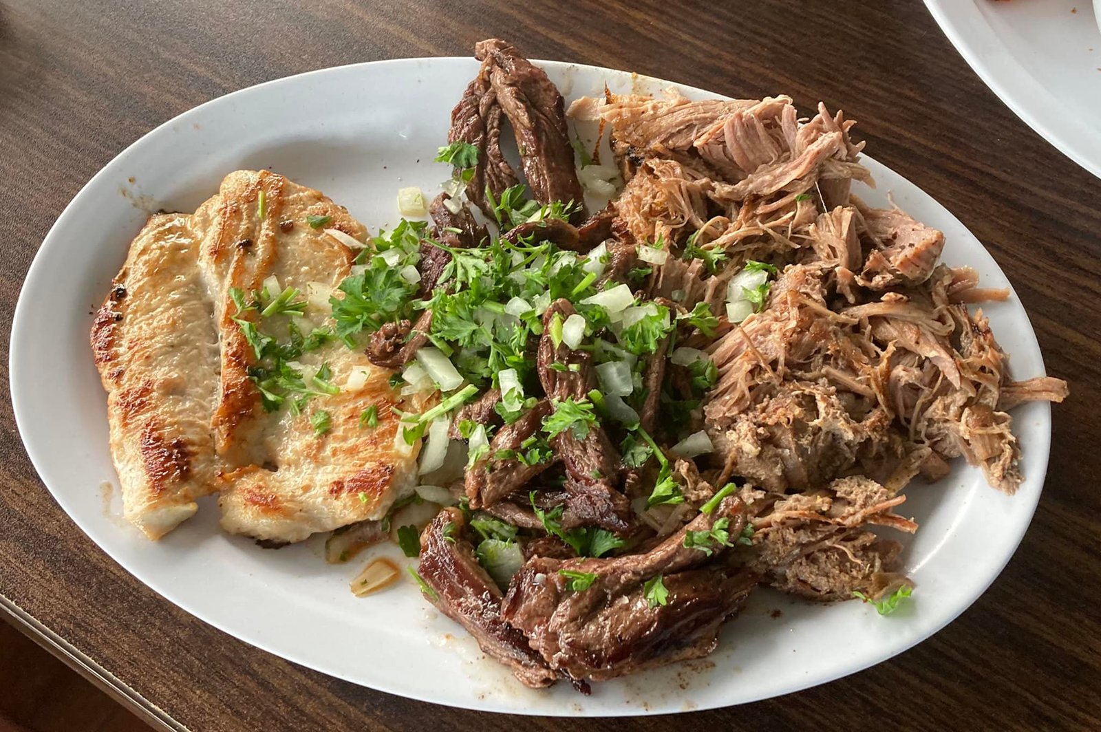 Pollo a la Planch, Lechon asado and Palomilla Stek