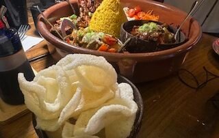 Tapioca chips and a mixed platter of Indonesian cuisine.