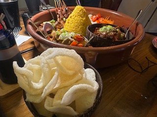 Tapioca chips and a mixed platter of Indonesian cuisine.