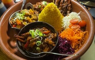 Mixed Indonesian food in a serving pot