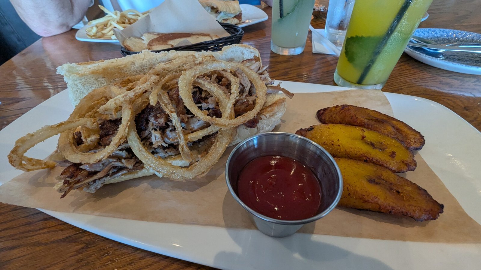 slow-roasted shredded pork drizzled with honey truffle and topped with crispy fried onions