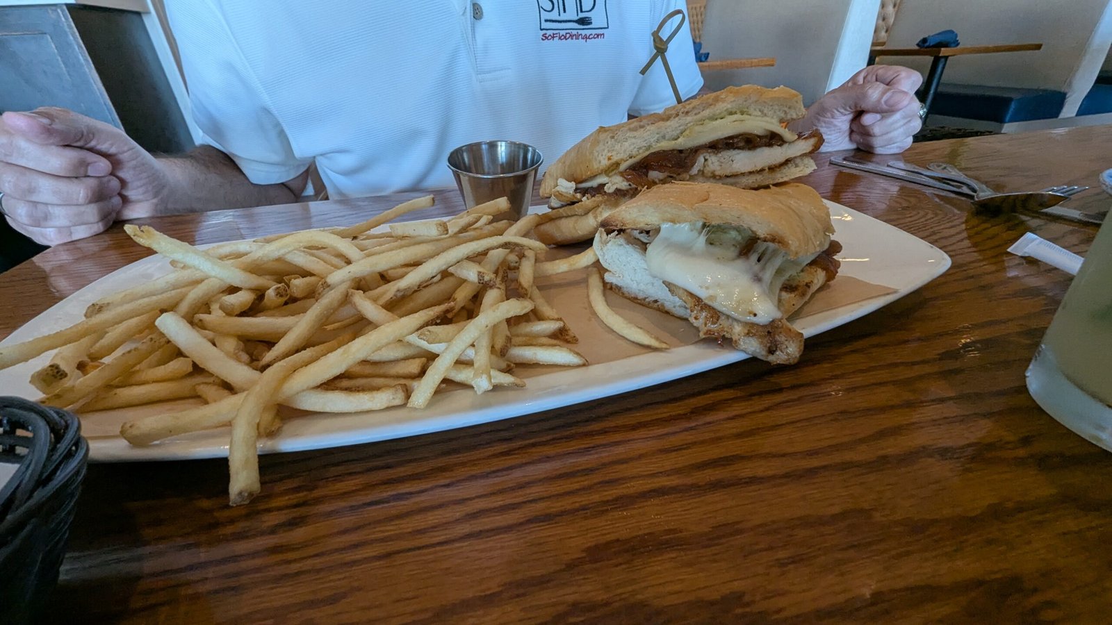 grilled chicken and caramelized onions topped with melted mozzarella, all tucked between hot-pressed Cuban bread.