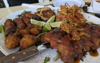 Mixed plate of Ribs, Crabcakes, Conch fritters and poppers
