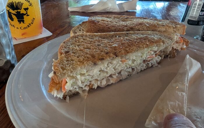 Frueben Crispy dolphin, swiss, and coleslaw on rye