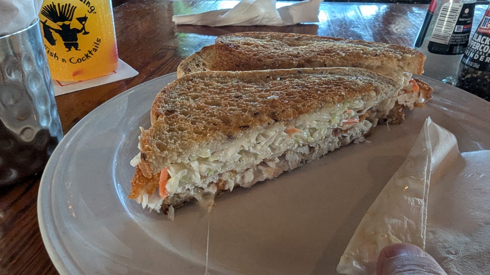 Frueben Crispy dolphin, swiss, and coleslaw on rye